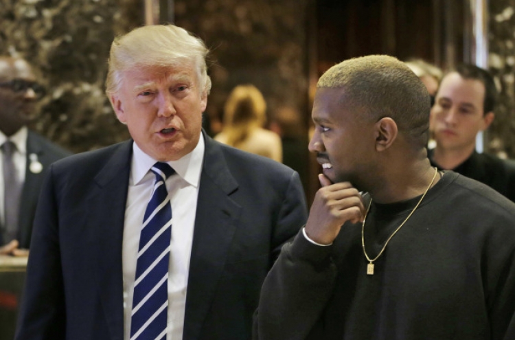 Kanye West emerges from hospital to meet Trump