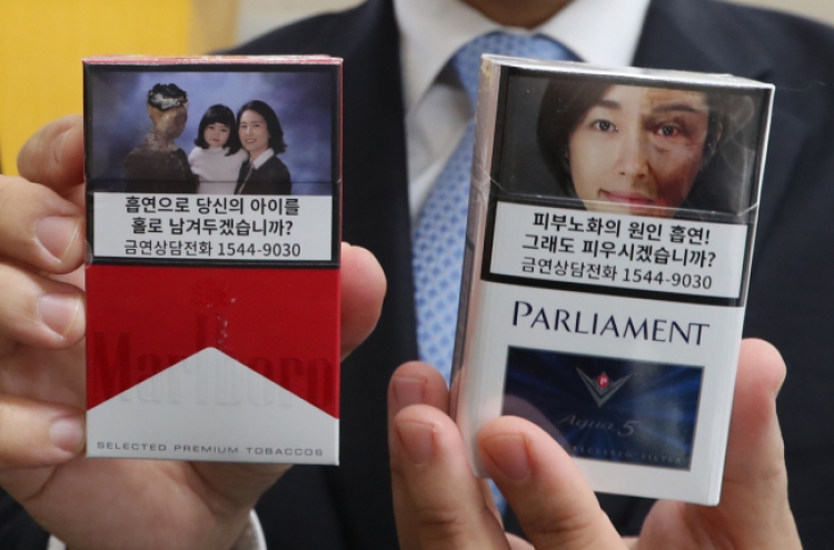 Cigarette packs to carry graphic health warnings