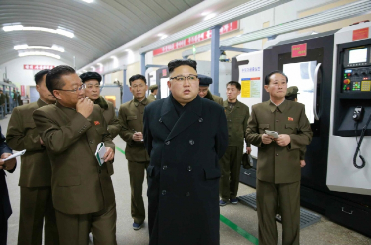 NK leader inspects precision machine plant