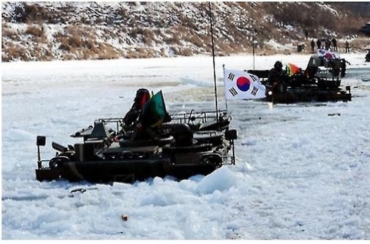 S. Korean mechanized troops stage frozen river crossing drill