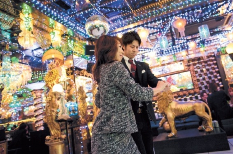 Japan's male hosts sell dreams to lonely women