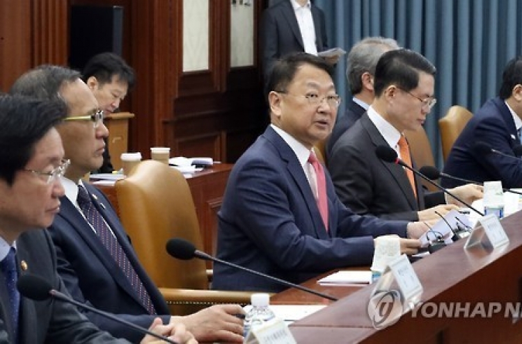 Korea's finance minister vows economic, diplomatic efforts to resolve tension with China