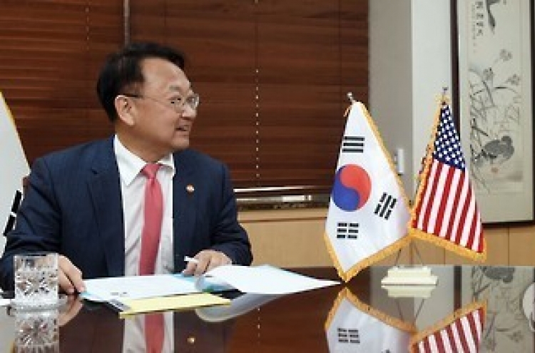 Korea's finance minister meets with AMCHAM president