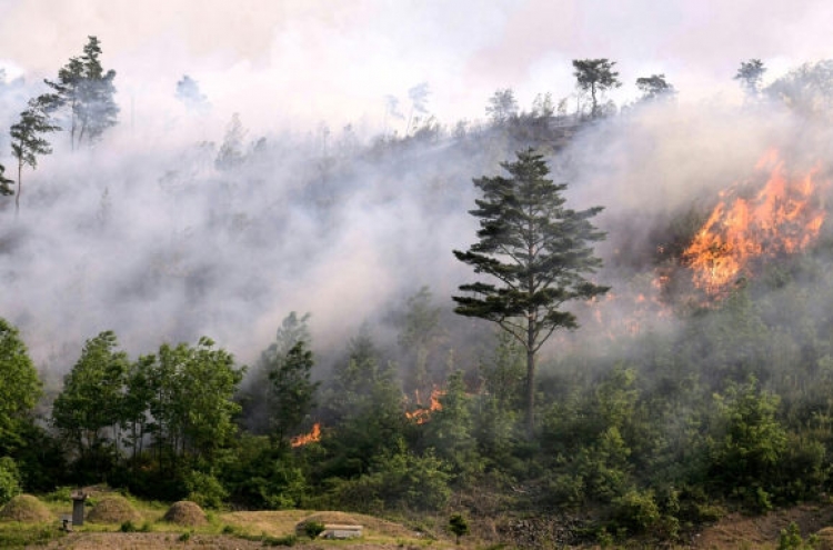 [Newsmaker] Hiker killed as wildfires ravage eastern areas