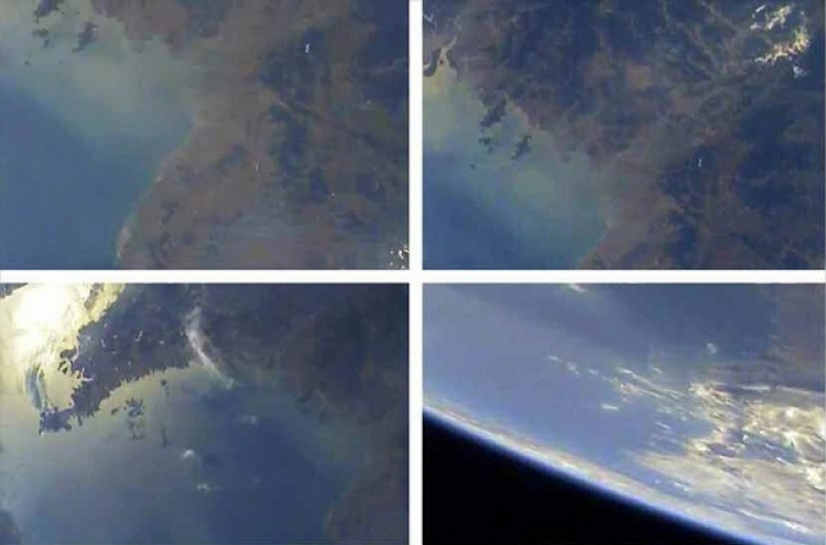 N. Korea unveils scores of earth photos taken from atmosphere