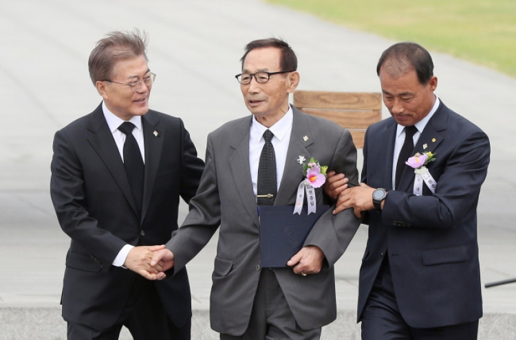 Moon promises better treatment for patriots, end to ideological division