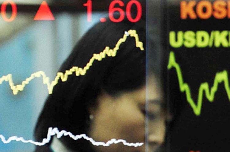 Korean shares down in late morning trading