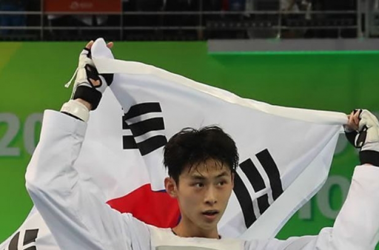 Kim Tae-hun wins 3rd straight gold at taekwondo worlds