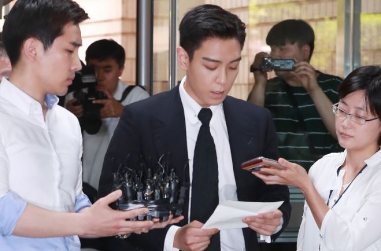T.O.P attends first hearing for marijuana charges, apologizes to mother
