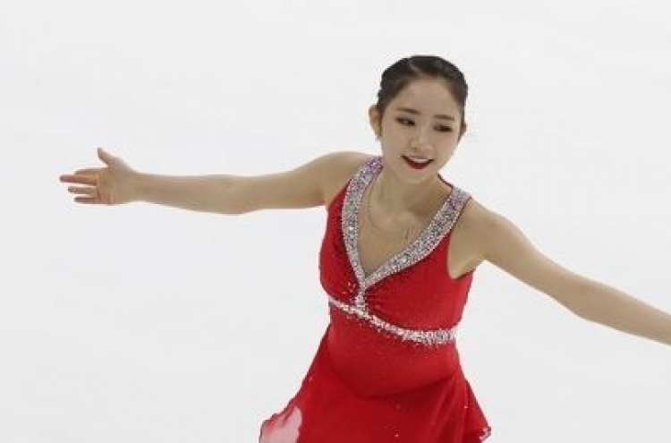 Teen figure skater wins 1st round of Olympic trials