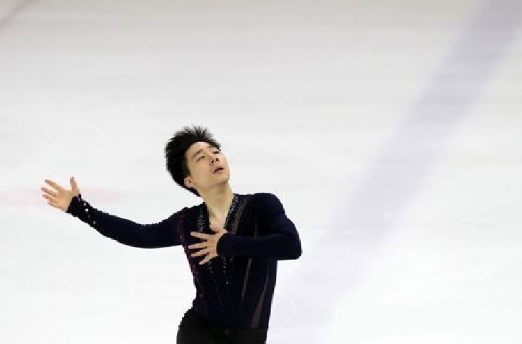 Ex-natl. figure skating champ headed to final Olympic qualifying event