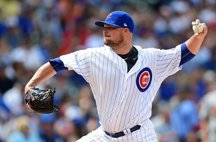 Lester hits first homer, throws 2,000th K in Cubs’ blowout win