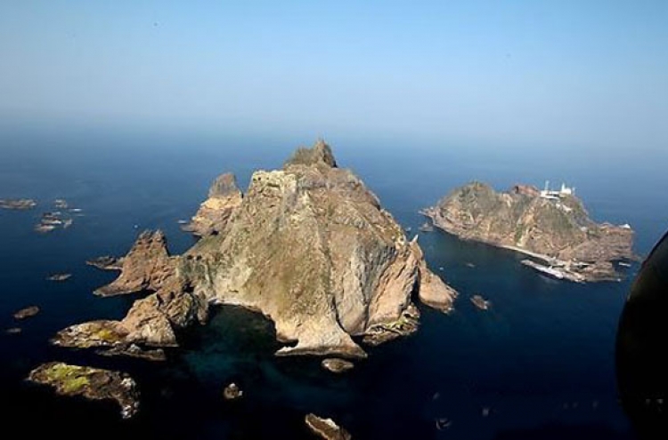Japan extends claims to Dokdo in high-speed train poster