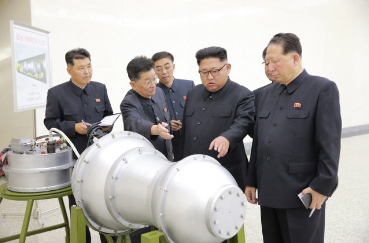 北 "ICBM 장착 수소탄 제작"…김정은 "강력한 핵무기 꽝꽝 생산"