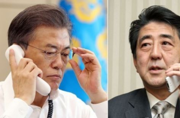 Moon, Abe agree to up pressure on NK to 'a whole new level'