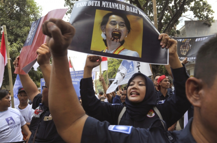Suu Kyi and Myanmar face chorus of anger over Rohingya crisis