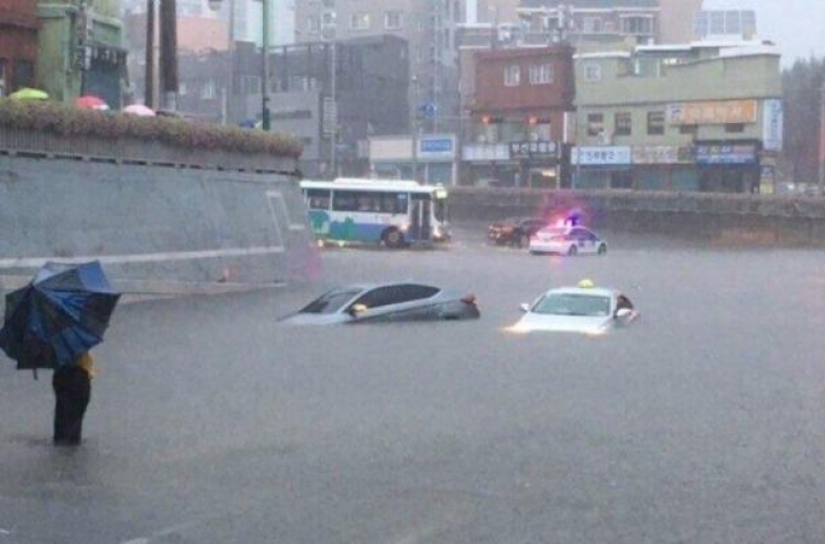 Torrential rain hits Busan, southern cities