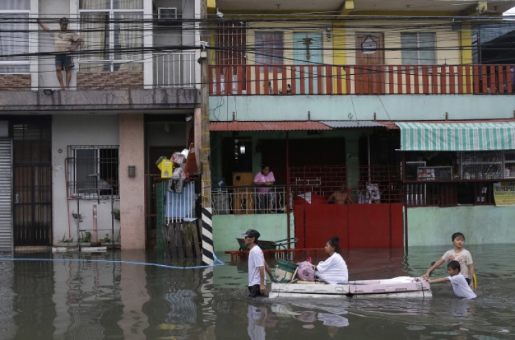 At least four dead as storm hits Philippines