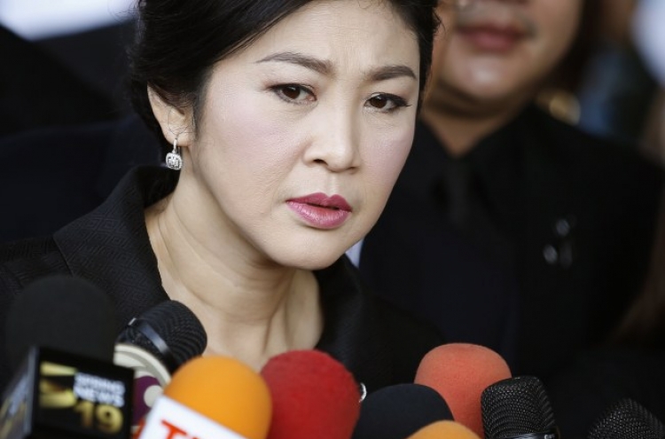 Ex-Thai leader sentenced in absentia to 5 years in prison
