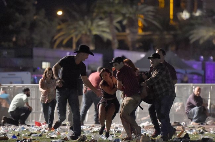 Sniper in high-rise hotel kills 59 in Las Vegas