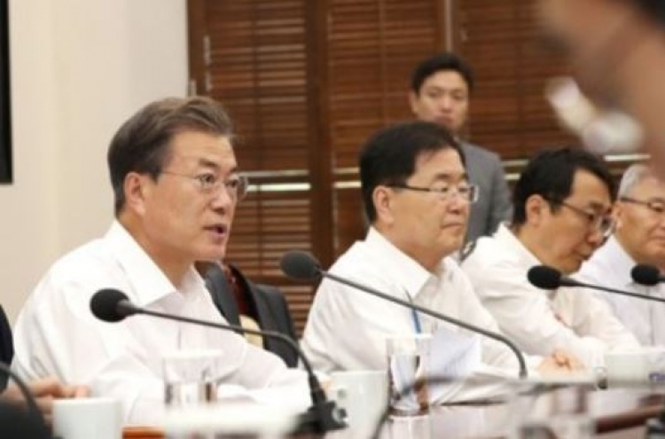 Moon urges efforts to reduce work hours, create more jobs