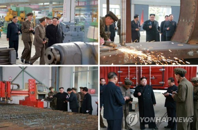 NK leader inspects truck factory, calls for modernizing automotive industry