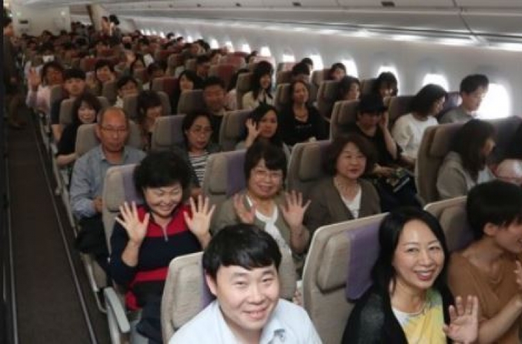 Koreans give themselves low scores on travel etiquette
