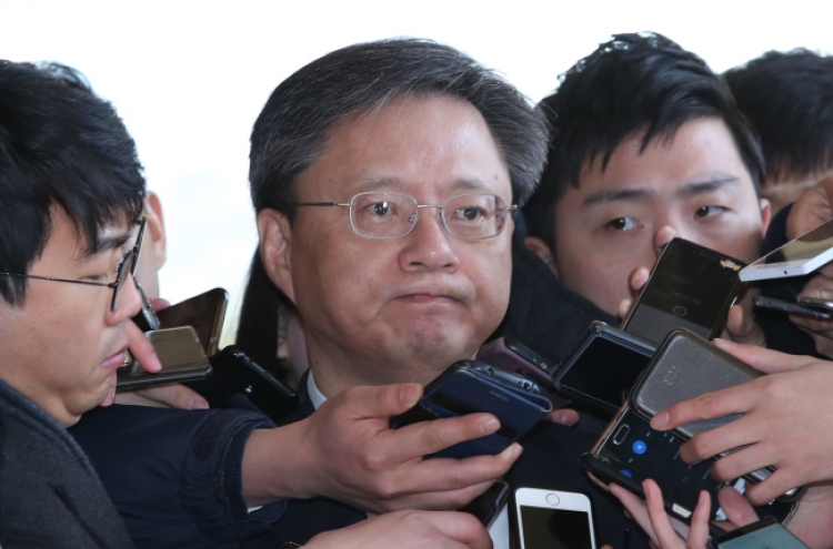 [Newsmaker] Park’s key aide Woo grilled over NIS scandal