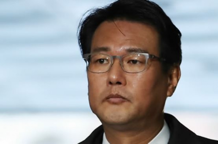 Court considers whether to approve arrest warrant for ex-Lee aide over election-meddling charges