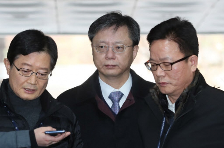 Ex-Park aide Woo fights third attempt at his arrest