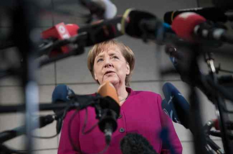 Merkel 'optimistic' in new bid to end political impasse