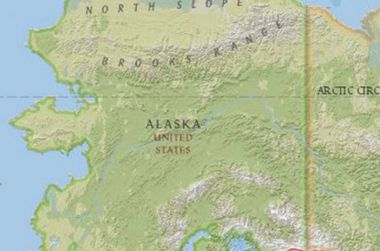 Tsunami warnings as powerful quake hits off Alaska