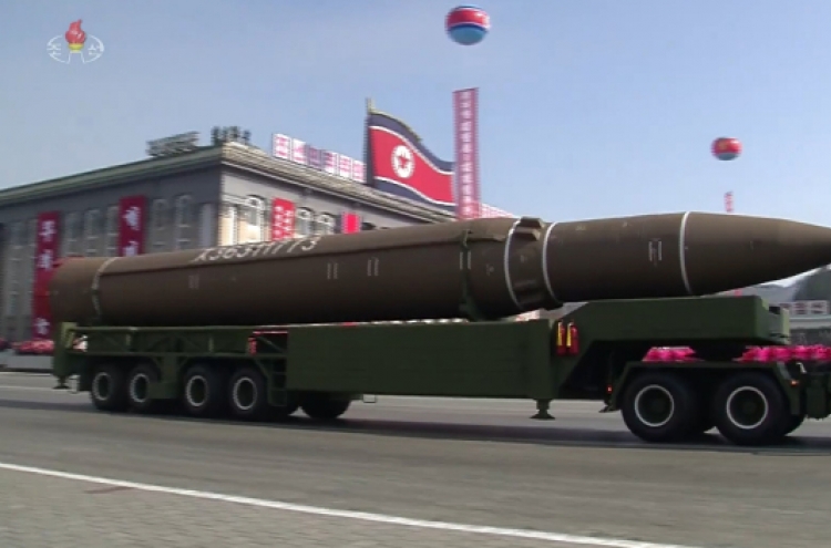 N. Korea displays ICBMs during low-key military parade