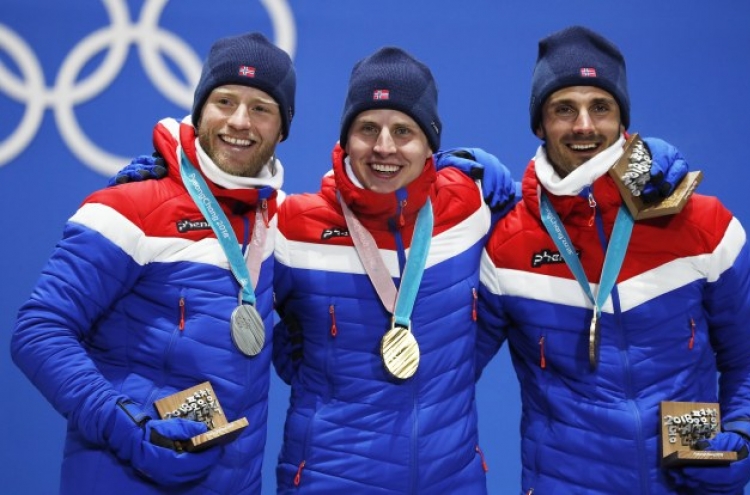 [Photo News] Norway sweeps gold, silver and bronze at men‘s 30 km skiathlon