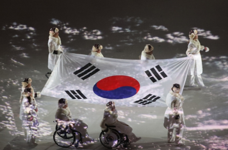 S. Korean Paralympic heroes bring national flag into opening ceremony