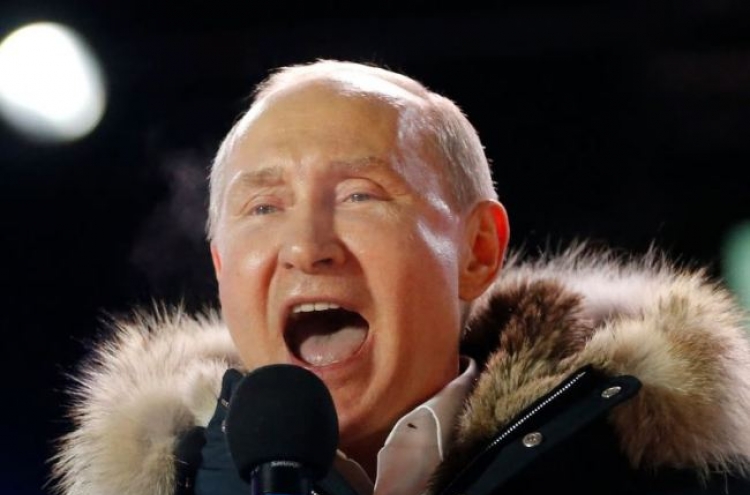 Putin claims crushing victory in Russian presidential vote