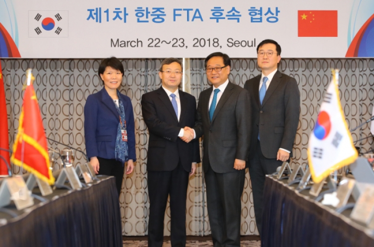 Korea, China begin follow-up FTA talks on services, investment
