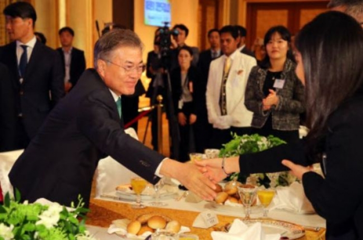 Moon signs bill on constitutional revision