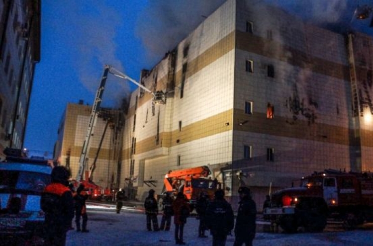 64 dead in Russian shopping mall inferno