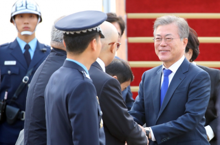 President Moon returns from trip to Vietnam, UAE