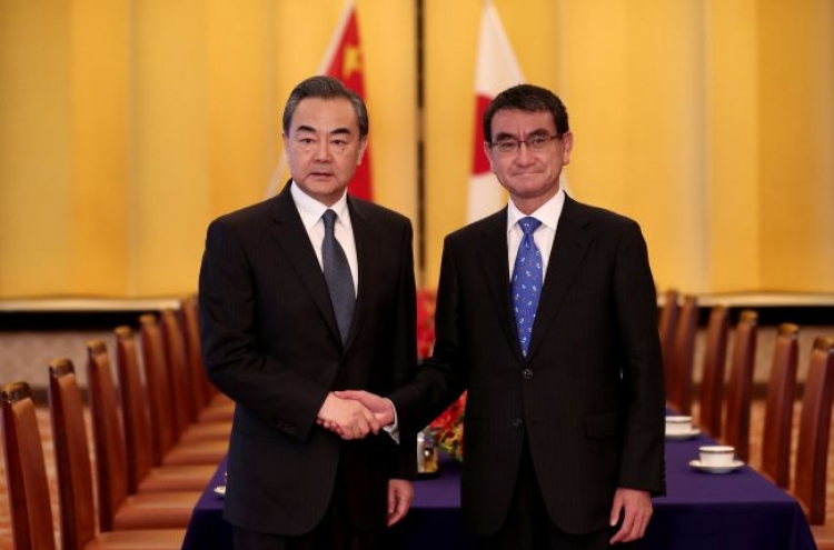 China FM visits Japan for talks on N. Korea, regional issues