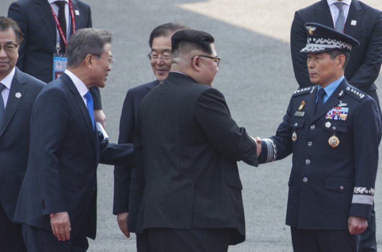 Different manners of greetings stress stark reality of unfinished war between Koreas