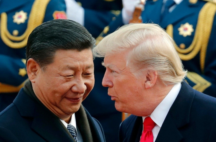 Trump, Xi agree to keep sanctions on NK until it denuclearizes