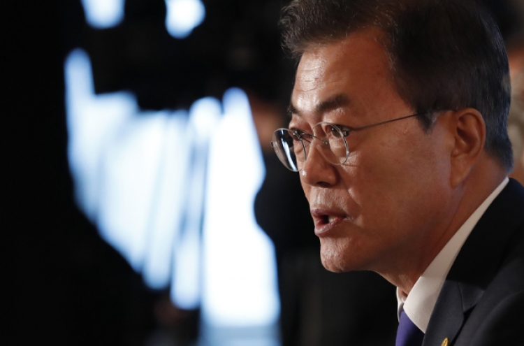 Moon commemorates 1980 democratic movement with pledge to find truth