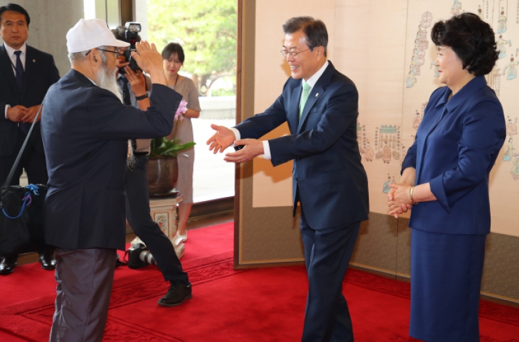 Moon vows continued support for national heroes, war veterans