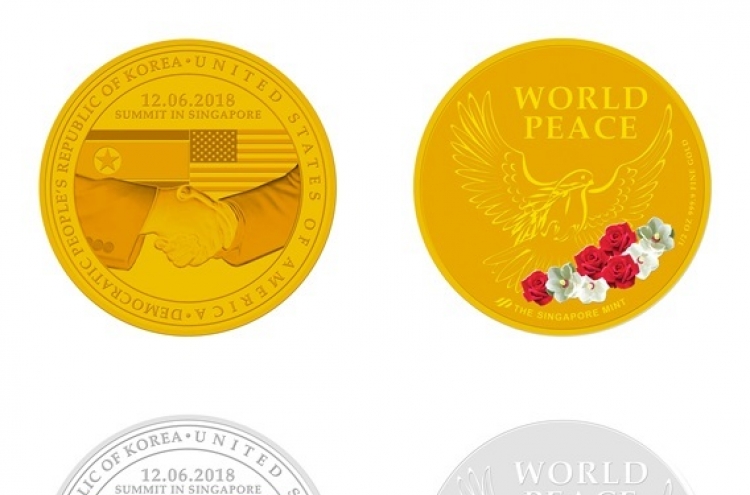 [Photo News] Singapore unveils commemorative coins for NK-US summit