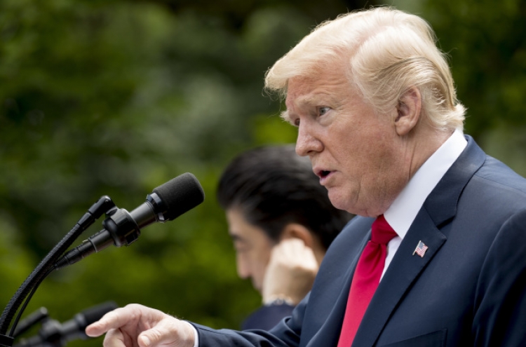 Trump says 'looking forward' to resolving trade disputes at G7