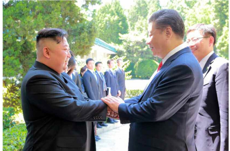 Kim, Xi discuss strengthening strategic, tactical cooperation: NK media