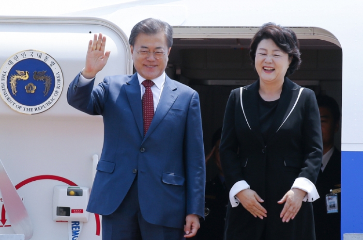 Moon returns from Russia visit