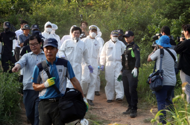 Autopsy to determine the identity of remains found on Gangjinsan